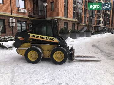New Holland LX565  - фото