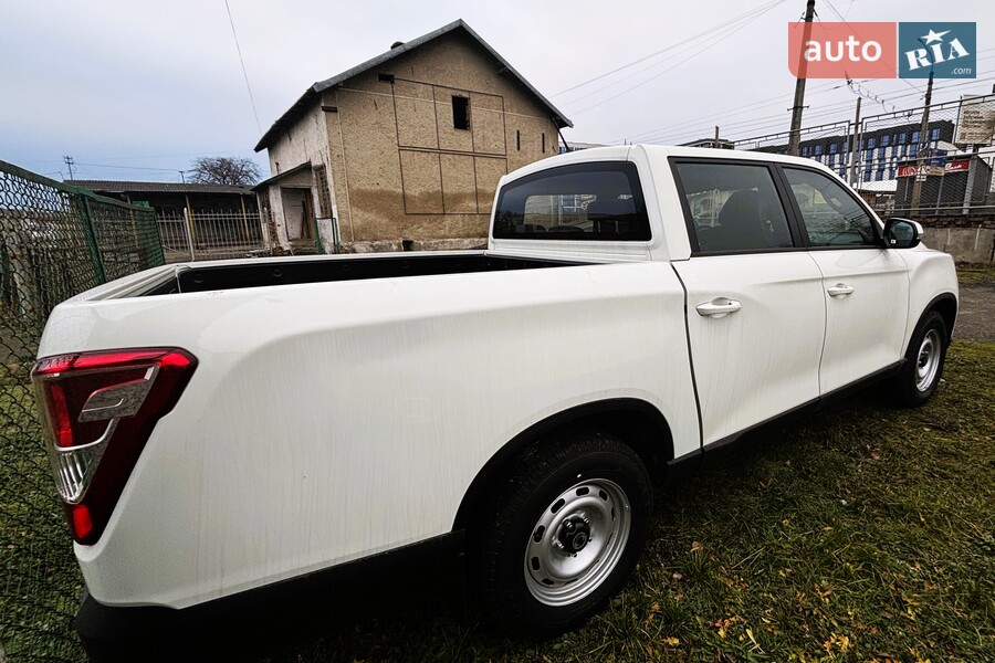 KG Mobility Grand Musso - фото 4