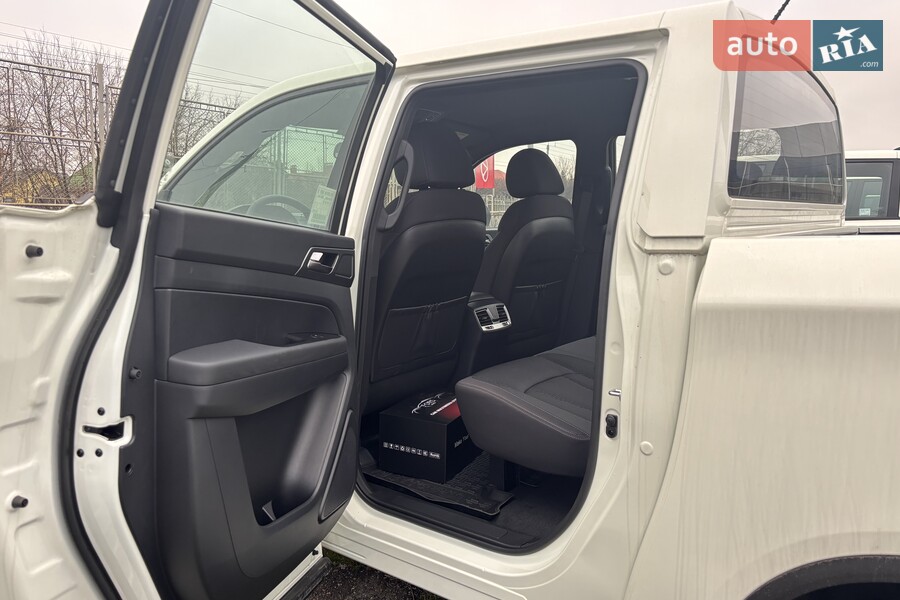 KG Mobility Grand Musso - фото 6