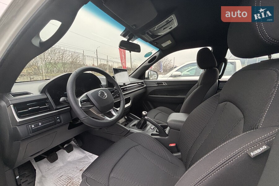 KG Mobility Grand Musso - фото 10