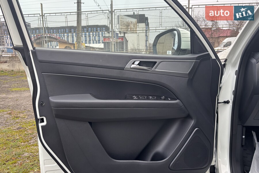 KG Mobility Grand Musso - фото 17