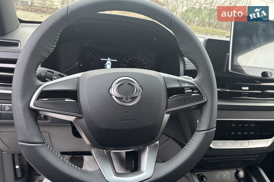 KG Mobility Grand Musso - фото 19