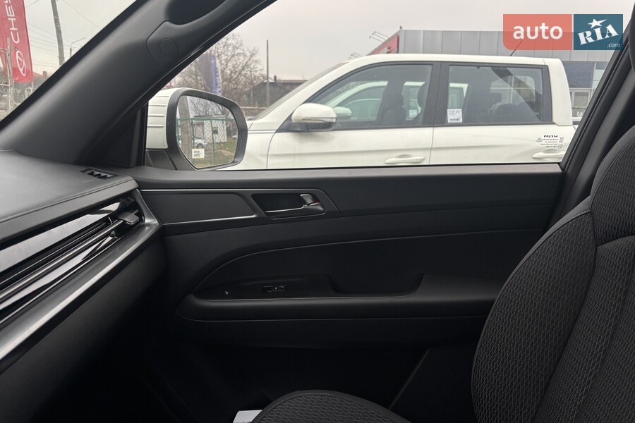 KG Mobility Grand Musso - фото 21