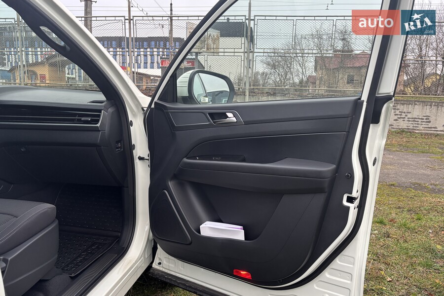 KG Mobility Grand Musso - фото 22