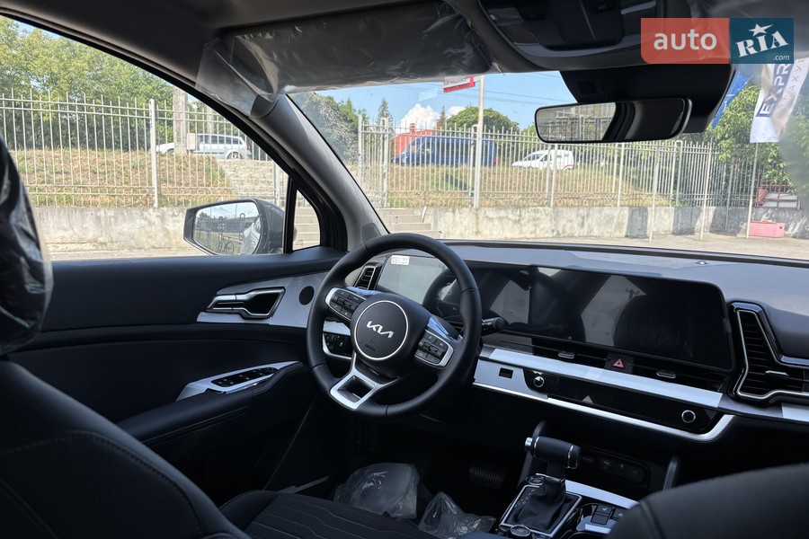 Kia Sportage - фото 14