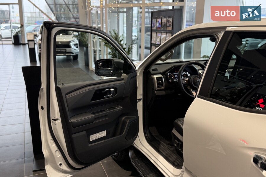 Mitsubishi L 200 - фото 11