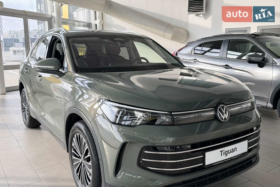 Volkswagen Tiguan - фото 1