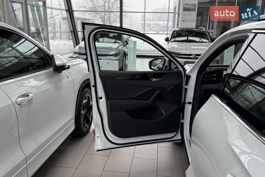 Volkswagen Tiguan - фото 11