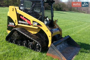 Caterpillar 247 I поколение Минипогрузчик