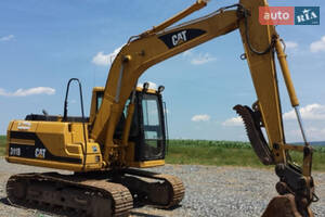 Caterpillar 311 I поколение Экскаватор