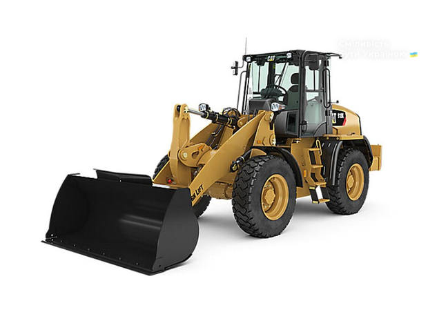 Caterpillar 910 I поколiння Фронтальний навантажувач