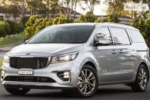 Kia carnival III покоління (FL) Мінівен