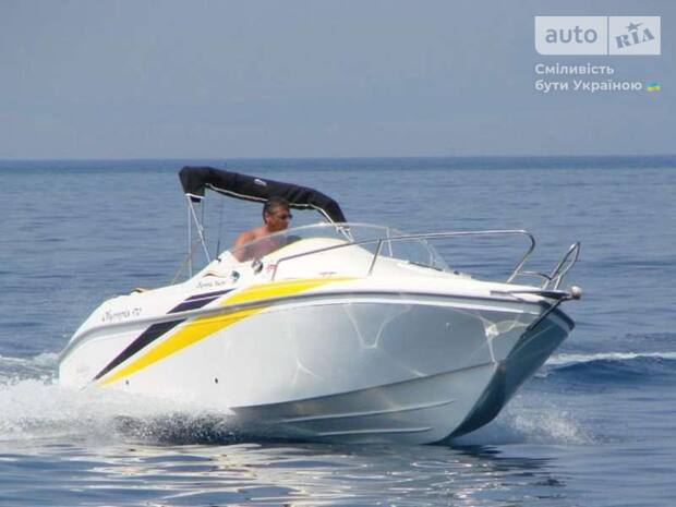 Olympia 570 Holiday I покоління Катер