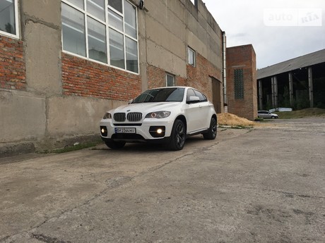 BMW X6 35i AT (306 л.с.) xDrive 2011