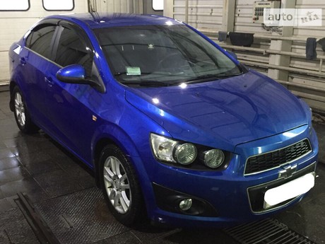 Chevrolet Aveo 1.6 MT (115 л.с.) 2012