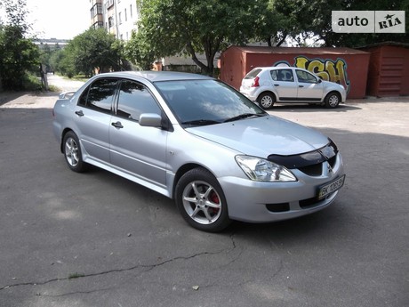 Mitsubishi Lancer 1.6 AT (98 л.с.) 2003