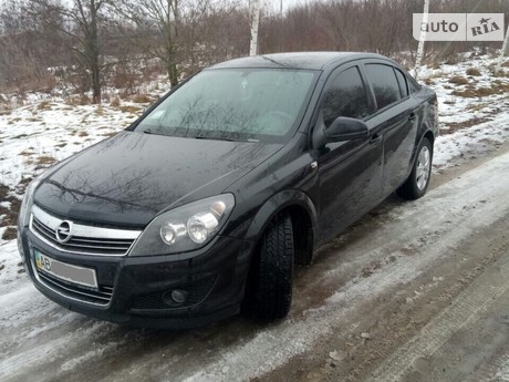 Opel Astra H 1.6 MT (115 л.с.) 2013