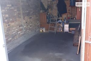 Продается место в гаражном кооперативе под легковое авто на 12 кв. м