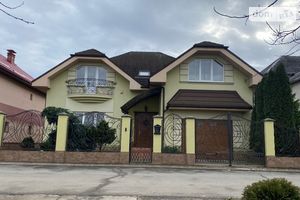 Продается дом на 2 этажа 294 кв. м с гаражом