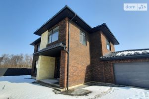 Продается дом на 2 этажа 230 кв. м с гаражом