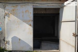 Продается место в гаражном кооперативе под легковое авто на 48 кв. м