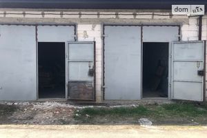 Продается место в гаражном кооперативе универсальный на 23 кв. м