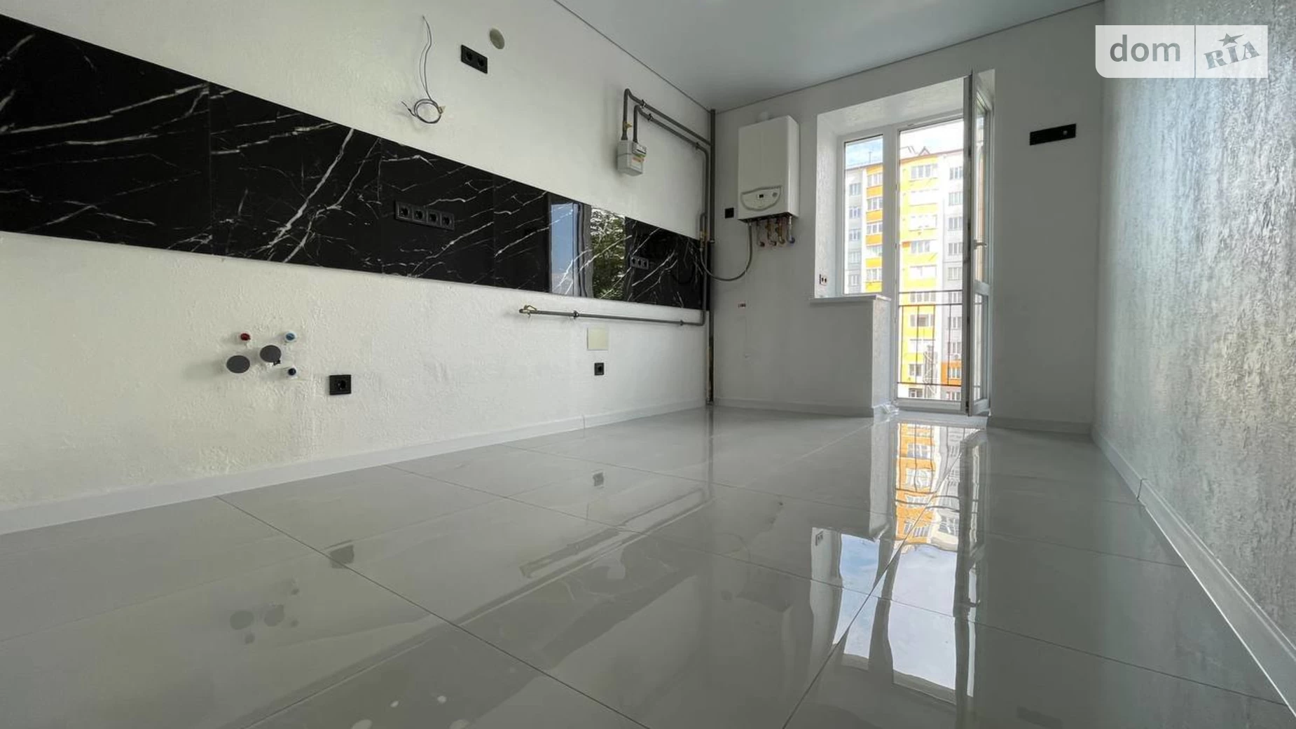 Продается 2-комнатная квартира 58 кв. м в Ивано-Франковске, ул. Урожайная, 7А - фото 4