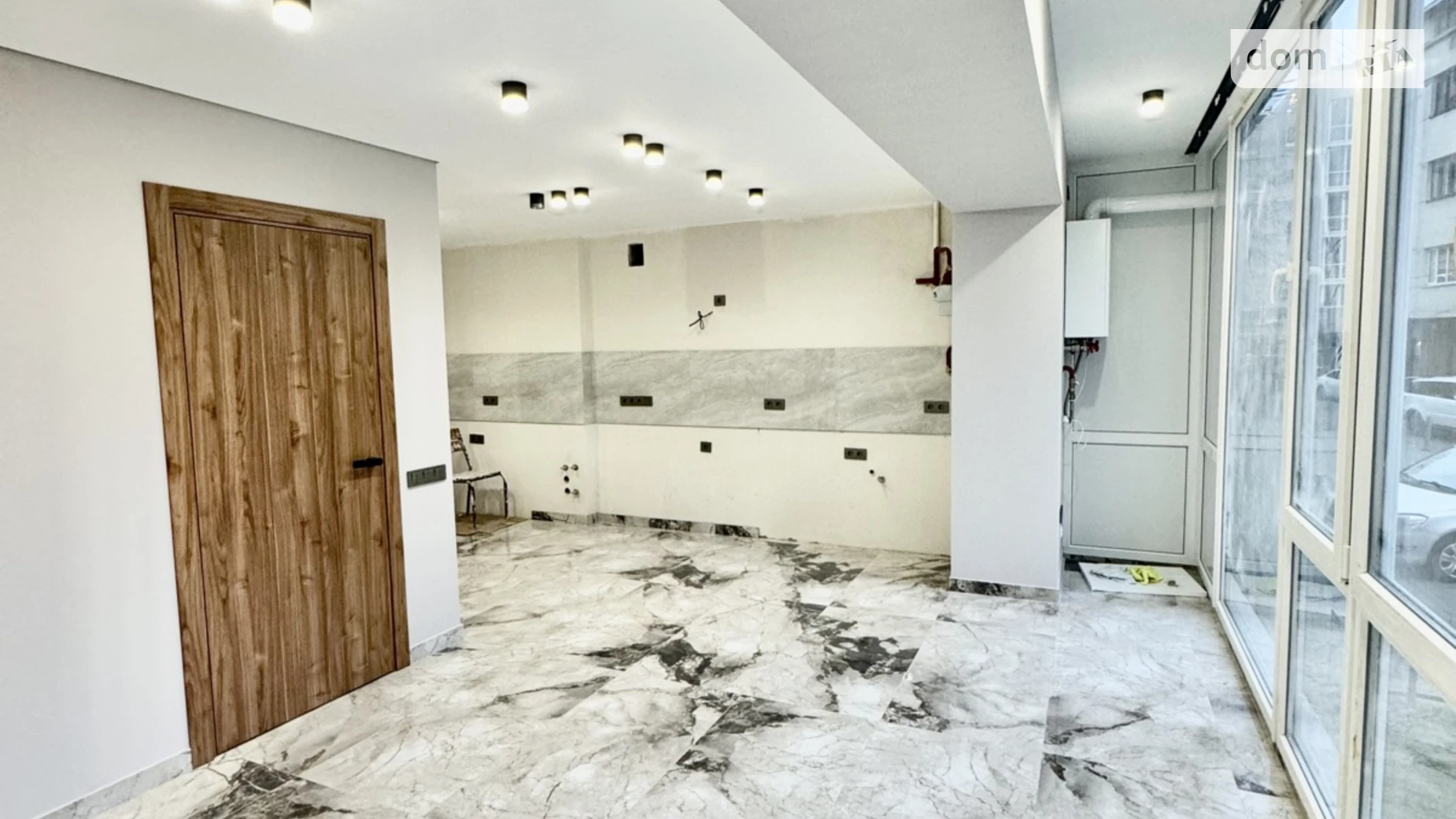 Сдается в аренду офис 60.9 кв. м в бизнес-центре, цена: 700 $ - фото 2