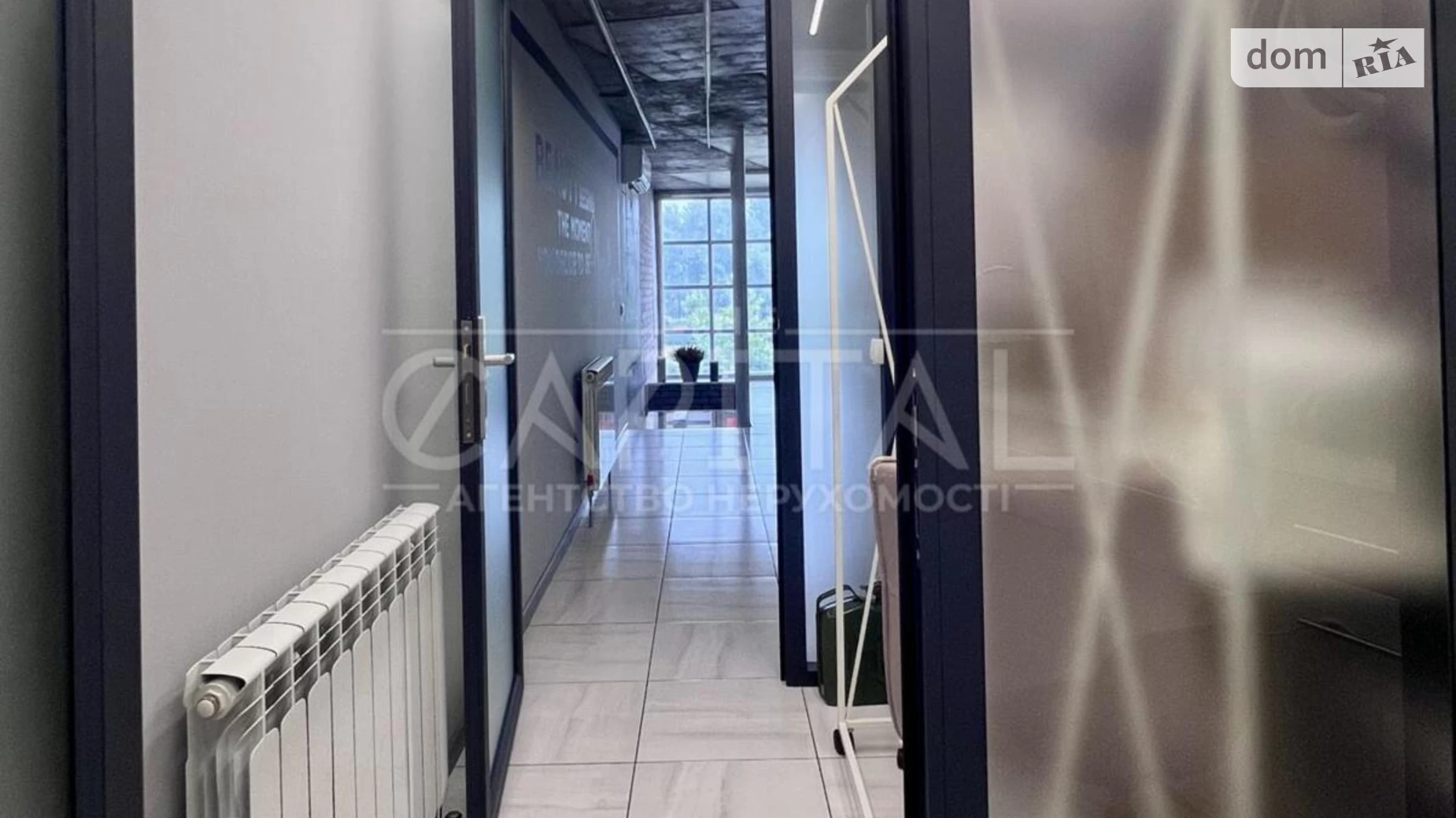 Сдается в аренду офис 100 кв. м в бизнес-центре, цена: 1500 $ - фото 4