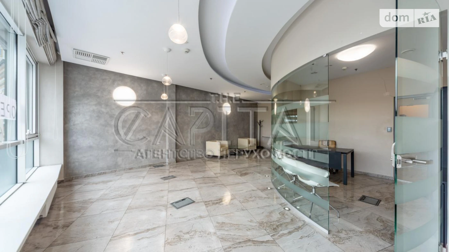 Сдается в аренду офис 65 кв. м в бизнес-центре, цена: 1200 $ - фото 2