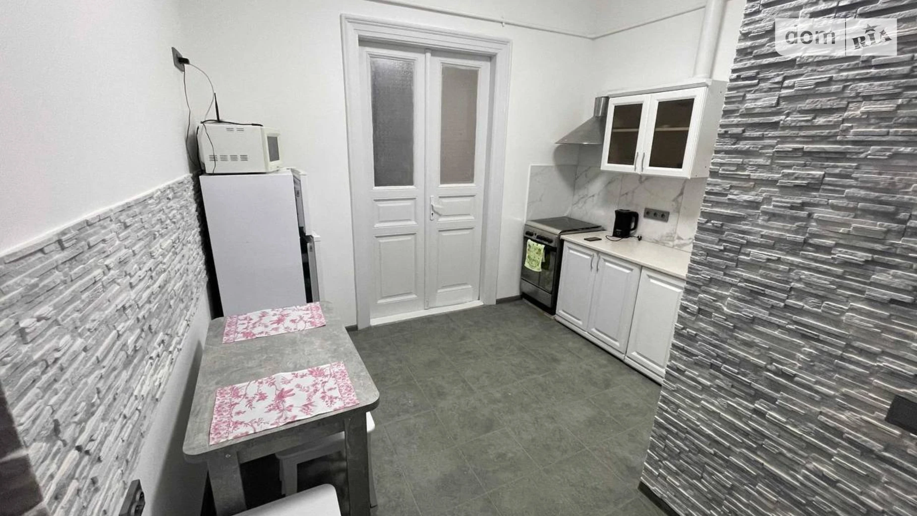 Сдается в аренду 1-комнатная квартира 47 кв. м в Львове, ул. Креховская, 10 - фото 5