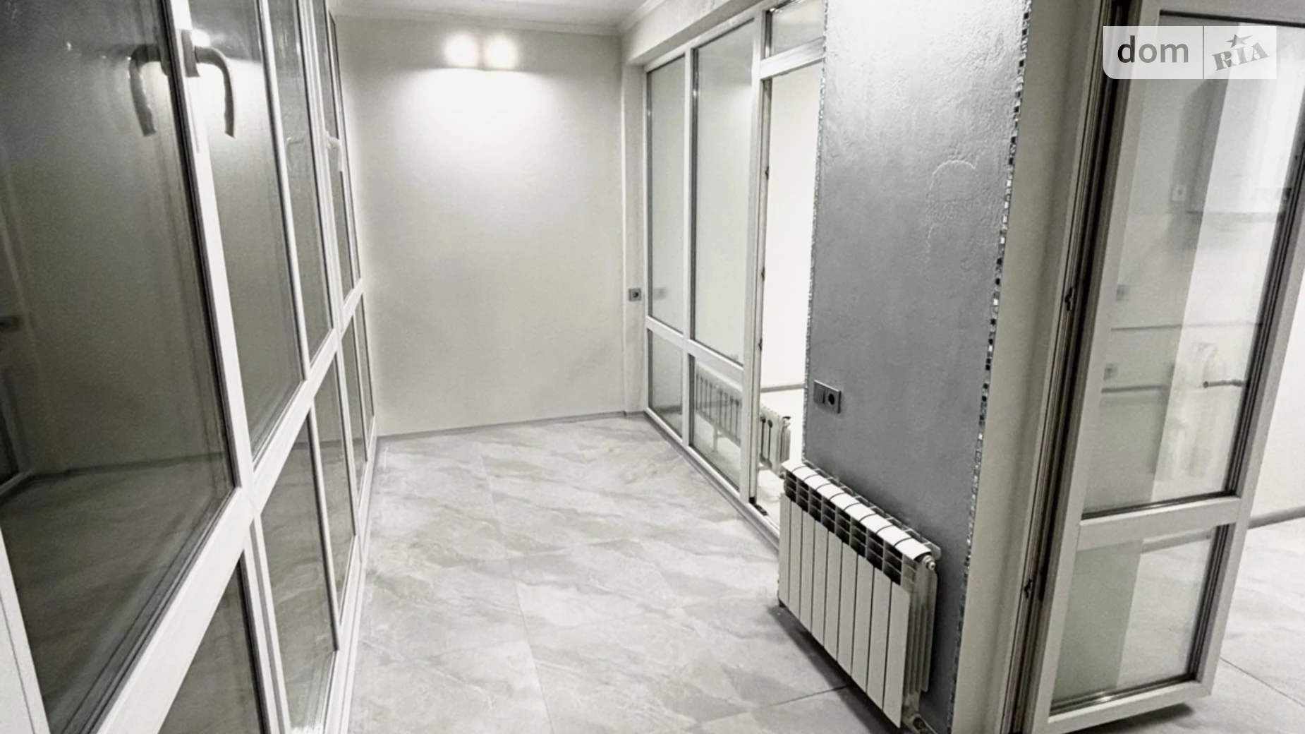 Продается 2-комнатная квартира 65.2 кв. м в Буче, ул. Ивана Кожедуба, 8А - фото 2