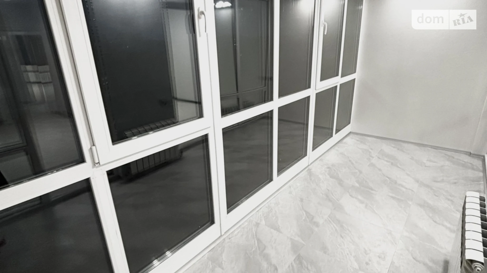 Продается 2-комнатная квартира 65.2 кв. м в Буче, ул. Ивана Кожедуба, 8А - фото 3