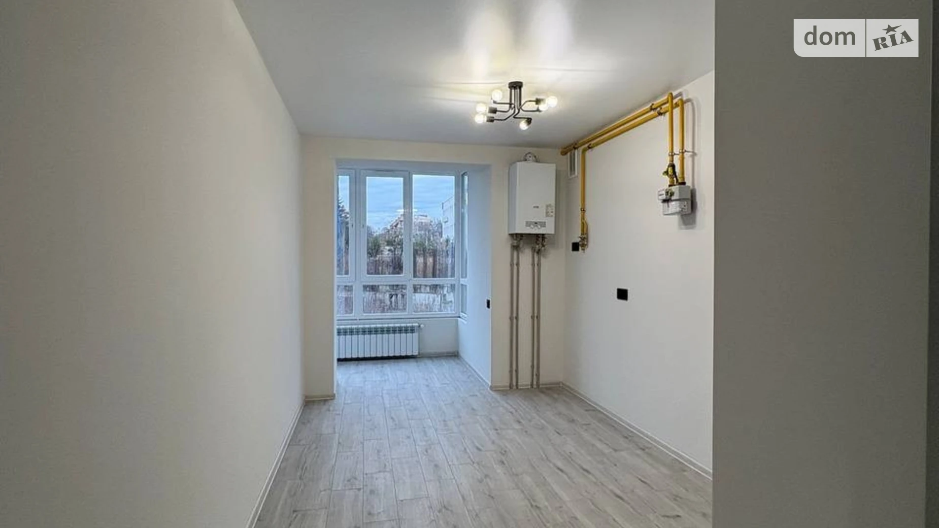 Продается 2-комнатная квартира 69.2 кв. м в Ровно, ул. Гайдамацкая, 13Б - фото 2