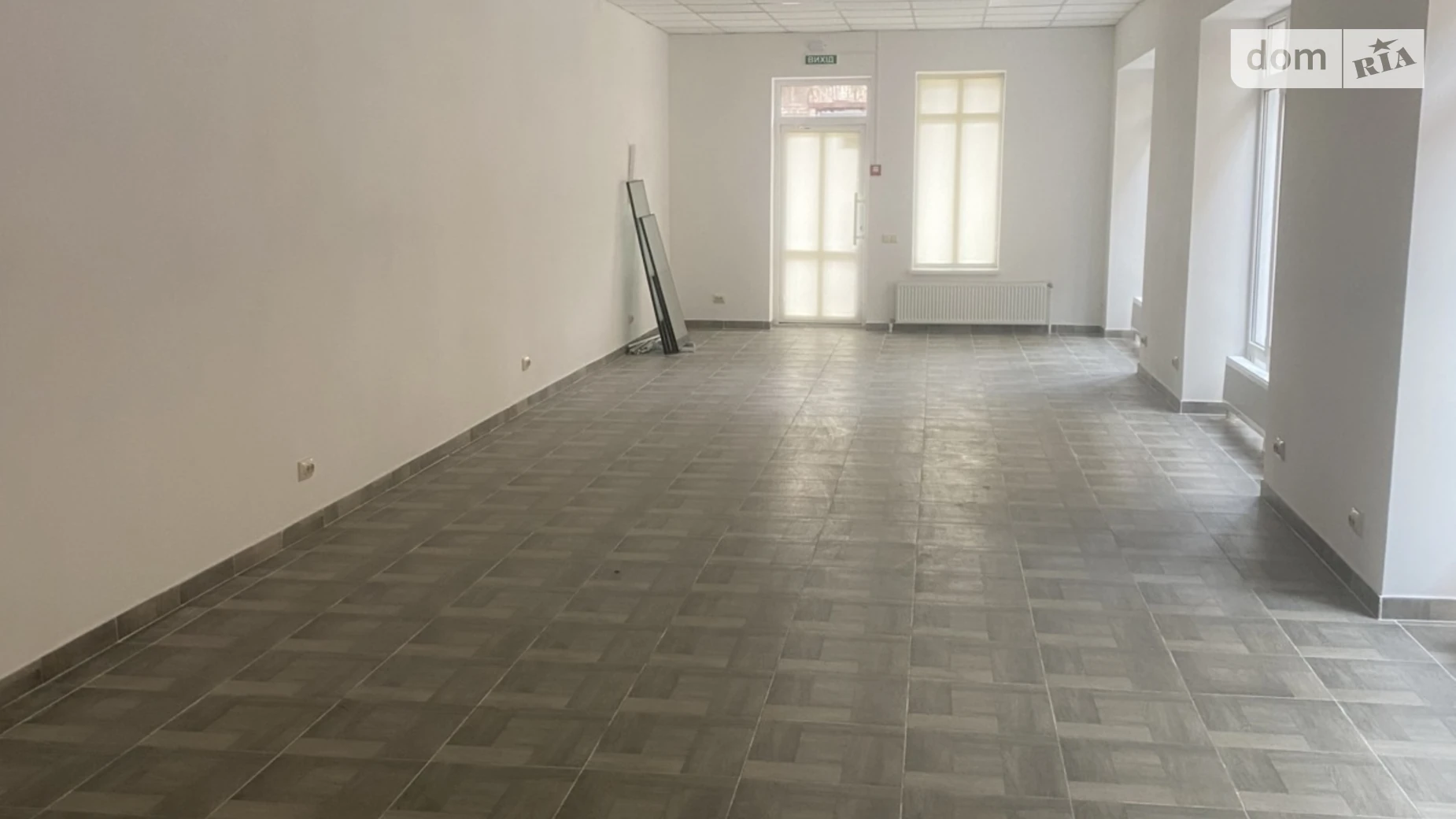 Сдается в аренду офис 65 кв. м в бизнес-центре, цена: 975 $ - фото 3