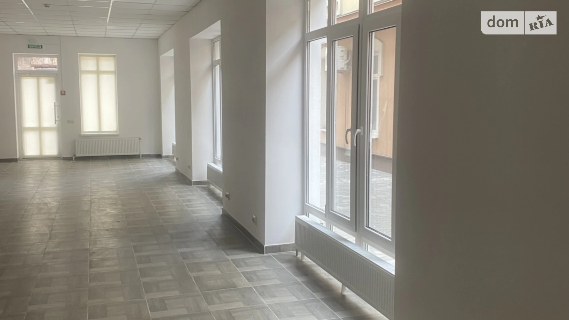 Сдается в аренду офис 65 кв. м в бизнес-центре, цена: 975 $ - фото 4