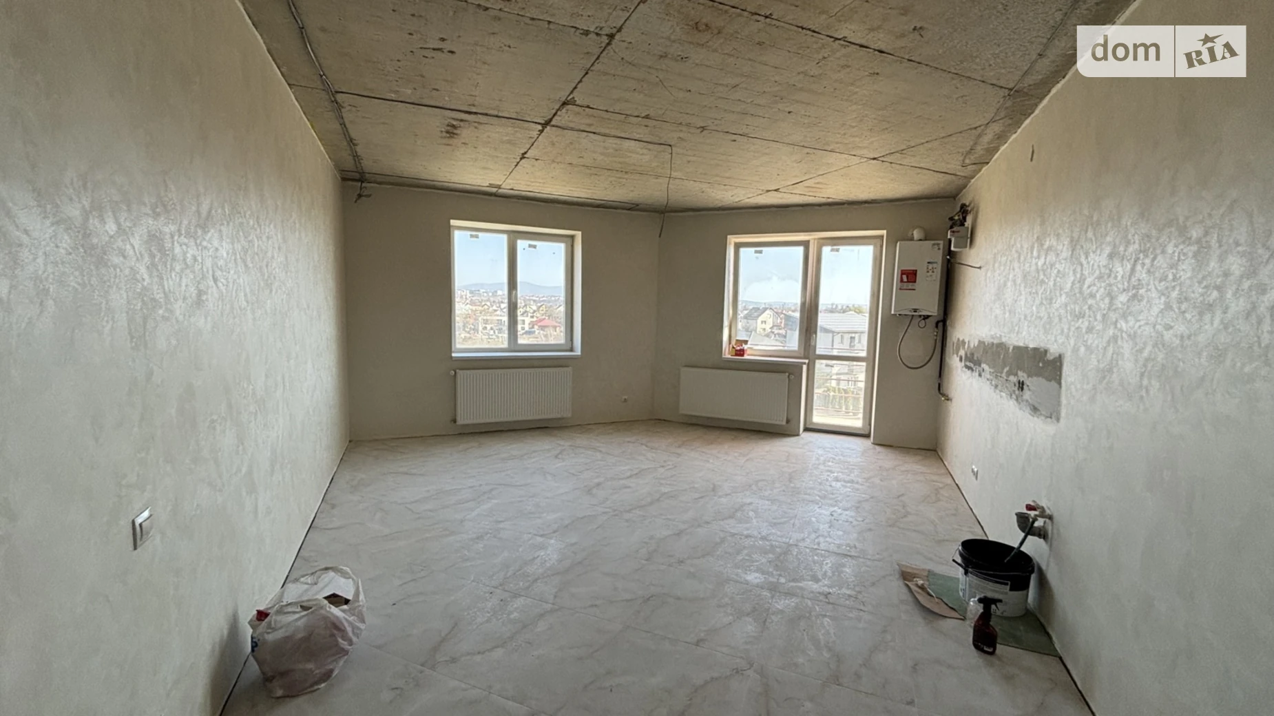 Продается 1-комнатная квартира 66 кв. м в Ужгороде, ул. Енковская, 33 - фото 2